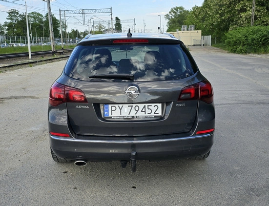 Opel Astra cena 25500 przebieg: 239000, rok produkcji 2014 z Poznań małe 277
